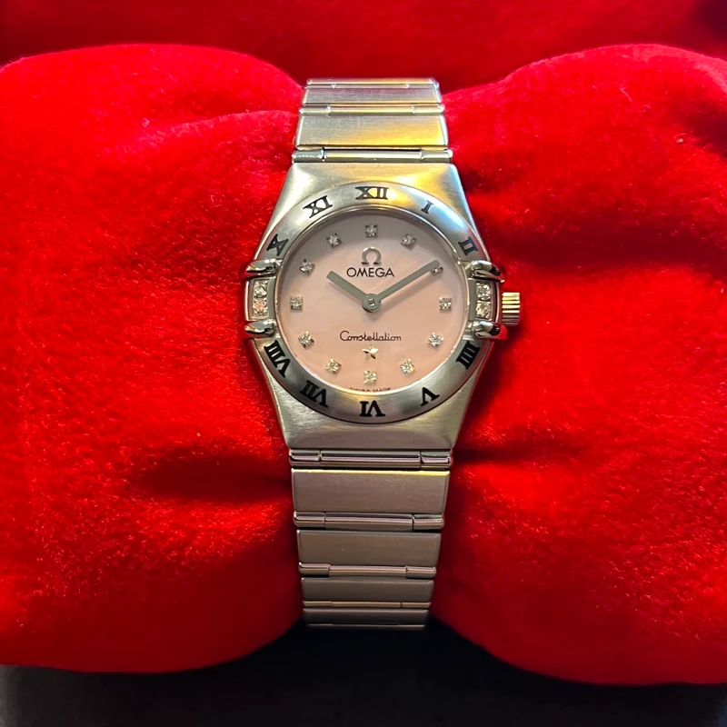 Omega Constellation cadran rose index diamant 1566.66