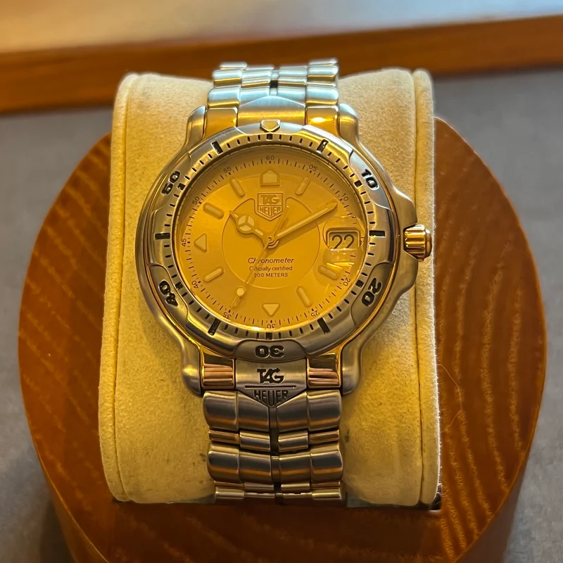 Montre automatique TAG Heuer Série 6000 en or jaune avec date WH5152