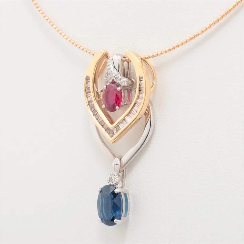 Collier Pigeon Blood Rubis 0.50 ct Saphir bleu 1.51 ct Diamants 0.05 ct